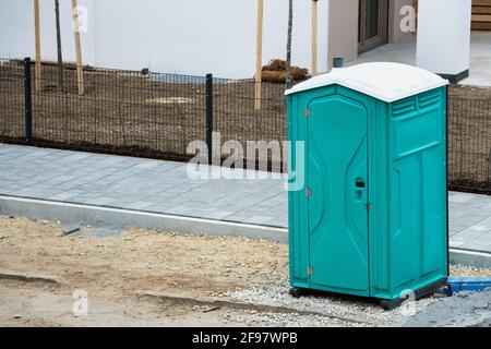 rent a mobile toilet for the construction workers. Service of a regional supplier and service company. copyspace Stock Photo