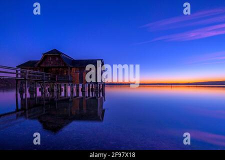 Boathouse at twilight on Ammersee, Stegen, Fünfseenland, Upper Bavaria, Bavaria, Germany, Europe Stock Photo