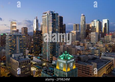 Historic core of downtown Los Angeles with Eastern building and city skyline at dusk Stock Photo