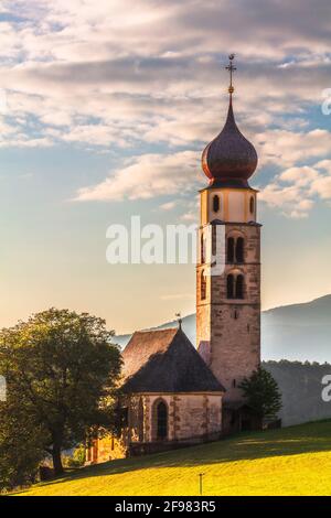 Tyrolean church with a clocktower Stock Photo