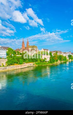 Riverside of Rhine in Basel dominated by majestic building of Munster ...