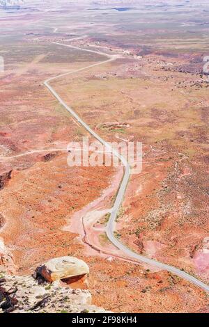 Winding roadway cutting through Valley of the Gods, Utah, USA, Stock Photo