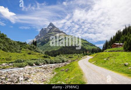 Alpine mountain landscape in the Rosanna valley near Sankt Anton on a sunny summer day. In the background the patteriol. Verwall, Tyrol, Austria Stock Photo