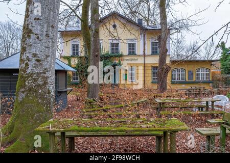 Lost Place, overgrown beer garden with moss-covered seating areas, Gasthof Obermuehltal, Bavaria, Germany, Europe Stock Photo