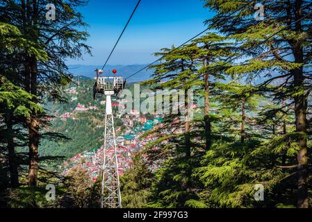 Bird eye view of Shimla City from Jakhu temple ropeway at Himachal Pradesh, India. Stock Photo