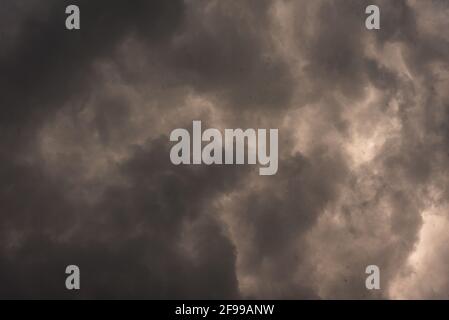 Background of dark clouds before a thunder-storm. They are formed due to intense western disturbance, an extra-tropical storm in Himalayas egion of Hi Stock Photo