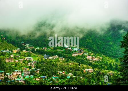 Dharamkot Village shrouded misty clouds in Monsoon season. It is a popular Heaven  for back packers, around 6km from Mcleod Ganj Town. Stock Photo