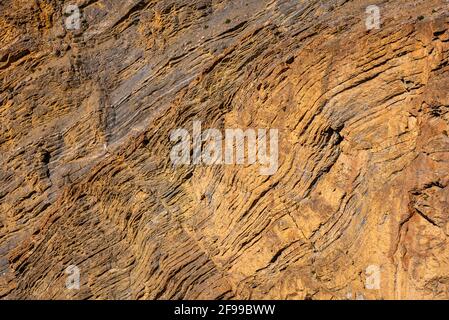 Limestone is a sedimentary rock forms when layers of skeletal fragments of marine organisms such as coral, foraminifera & molluscs accumulates by sedi Stock Photo