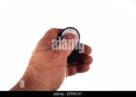 camera remote control in hand of photographer isolated on white background Stock Photo