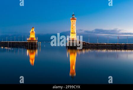 Port entrance of Lindau on Lake Constance at night Stock Photo