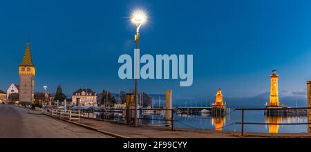 Port entrance of Lindau on Lake Constance at night Stock Photo