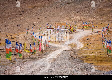 Stupa at Kunzum Pass at 4,590 m is a high mountain pass on Kunzum Range of the Himalayas connects Lahaul valley and Spiti valley from Manali in Himach Stock Photo