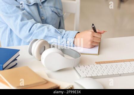 Female student studying online at home Stock Photo