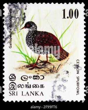 MOSCOW, RUSSIA - NOVEMBER 4, 2019: Postage stamp printed in Sri Lanka shows Sri Lanka Spurfowl (Galloperdix bicalcarata), Birds serie, circa 1979 Stock Photo