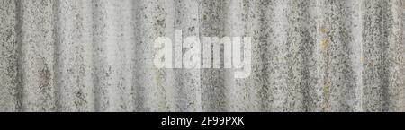 The texture of the old gray wavy slate pavement. Slate roof. Weathered surface. Grey colour. Retro style. Background image. Template for text. Stock Photo