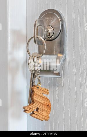 A hotel room key with a hare motif key fob Stock Photo