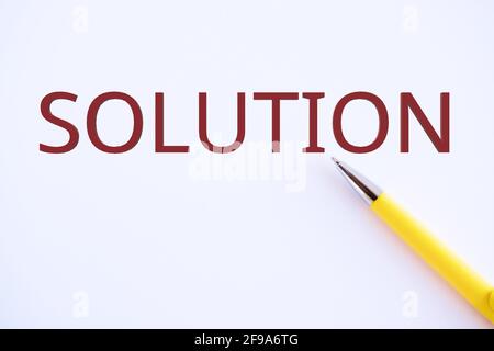 Conceptual hand writing showing SOLUTION: Business concept for Alternative or approach that best fits the current situation Stock Photo