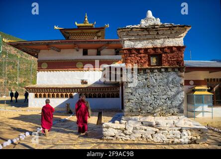 The Chimi Lhakhang is a Buddhist monastery in Bhutan. It is located near Sopsokha village in the Punakha District of Bhutan. Pilgrims and tourists hav Stock Photo