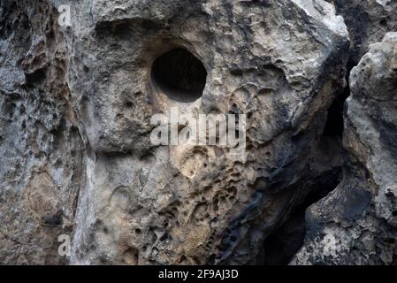 weather-eroded stone textures on the coast Stock Photo