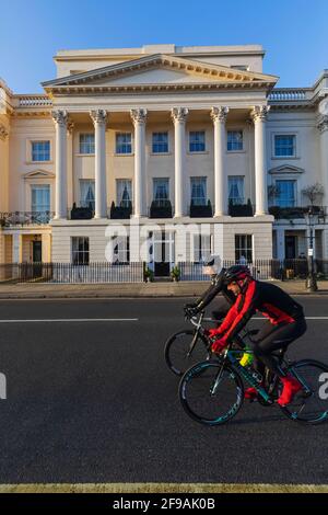 England, London, Regent's Park, Cyclists in Front of Cornwall Terrace Mews Stock Photo