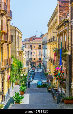 CATANIA, ITALY, APRIL 27, 2017: View of a narrow street in Catania, Sicily, Italy Stock Photo