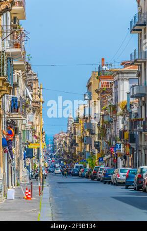 CATANIA, ITALY, APRIL 27, 2017: View of a narrow street in Catania, Sicily, Italy Stock Photo