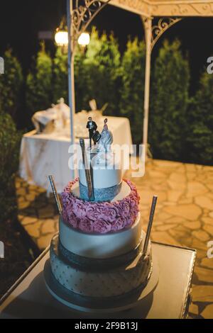 Vertical shot of a beautiful wedding cake Stock Photo