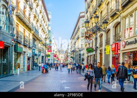 ZARAGOZA, SPAIN,NOVEMBER 1,2014: People are strolling through calle de alfonso I in Zaragoza, Spain Stock Photo