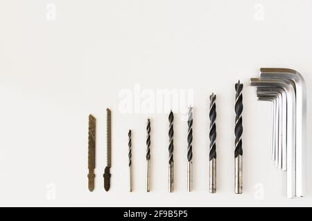 Set of stainless drills and cordless power tools on a white background Stock Photo