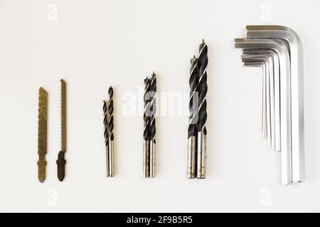 Set of stainless drills and cordless power tools on a white background Stock Photo