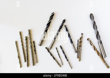 Set of stainless drills and cordless power tools on a white background Stock Photo