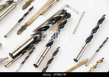 Set of stainless drills and cordless power tools on a white background Stock Photo