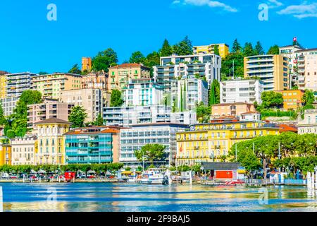 LUGANO, SWITZERLAND, JULY 25, 2017: Old town of Lugano facing the Lugano lake in Switzerland Stock Photo