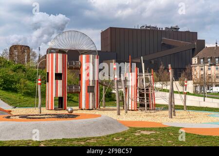 City park, park on the doorstep, on Kaiser-Wilhelm-Strasse, in Duisburg-Bruckhausen, at the ThyssenKrupp Steel steelworks Bruckhausen, playground,  Ox Stock Photo