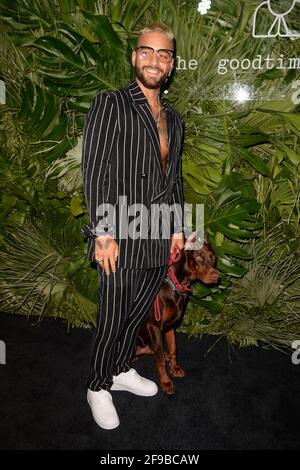 MIAMI BEACH, FL - APRIL 16: Maluma attends the Grand Opening Party Hosted By David Grutman And Pharrell Williams at The Goodtime Hotel on April 16, 2021 in Miami Beach, Florida. CreditL: mpi04/MediaPunch Stock Photo