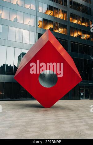 Isamu Noguchi’s Red Cube, in the Financial District, Manhattan, New York City Stock Photo