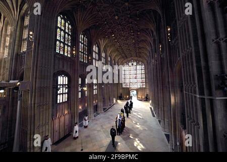 Pall Bearers carrying the coffin of the Duke of Edinburgh, followed by members of the Royal family entering St George's Chapel, Windsor Castle, Berkshire. Picture date: Saturday April 17, 2021. Stock Photo