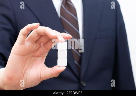 Male hand holding a ballpoint pen Stock Photo
