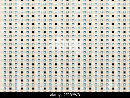 Repeated pattern of windows in monotonous skyscraper, abstract composite pattern and texture Stock Photo