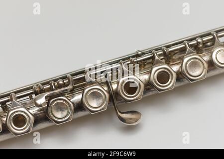 Diagonal close-up image of flute buttons on white background Stock Photo