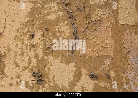Beige grunge wall texture with dark brown spots Stock Photo
