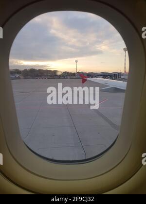 DUESSELDORF, NRW, GERMANY - NOVEMBER 11, 2019: Window view from the passenger seat of a passenger plane Stock Photo