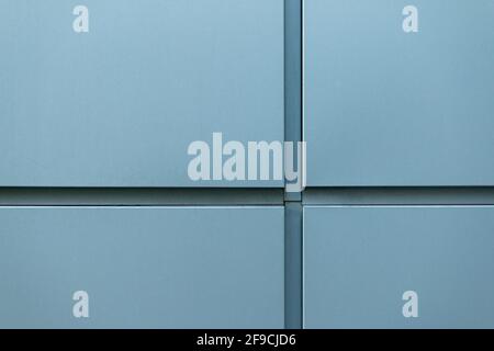 Cross-shaped metal cladding panels on the building wall Stock Photo - Alamy