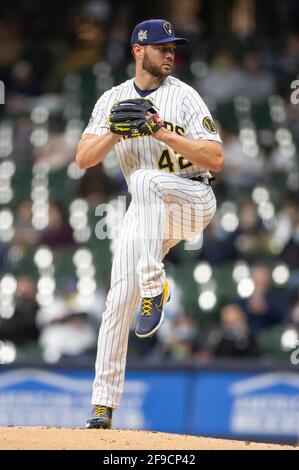 April 16, 2021: Milwaukee Brewers Jace Peterson #14 races to the third base  on Jackie Bradley Jr. single in the 7th inning of the Major League Baseball  game between the Milwaukee Brewers