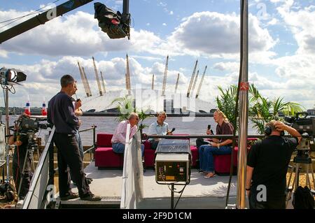 Jodie Kidd and James Cracknell working on the presenting team at the Red Bull Air Race at Docklands, London, UK, in 2007, with O2 arena Stock Photo