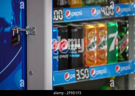 Bucharest, Romania - March 29, 2021 A fridge showcase with several brands of carbonated drinks in colorful bottles. This image is for editorial use on Stock Photo