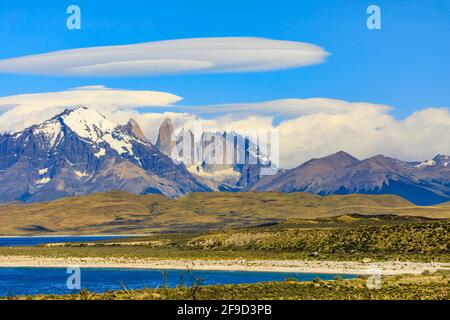 The jagged granite Torres del Paine mountain peaks and towers in Torres del Paine National Park, Patagonia, southern Chile, viewed over Lake Sarmiento Stock Photo