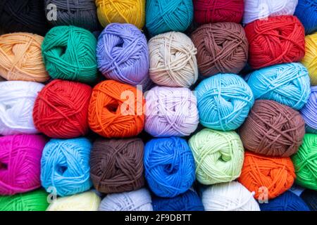 A collection of colorful Yarn balls on a market Stock Photo
