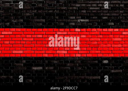 black red colored brick wall background Stock Photo