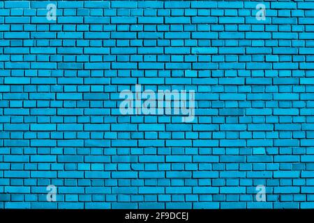 light blue colored brick wall background Stock Photo